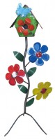 metal bird house on stand with flowers